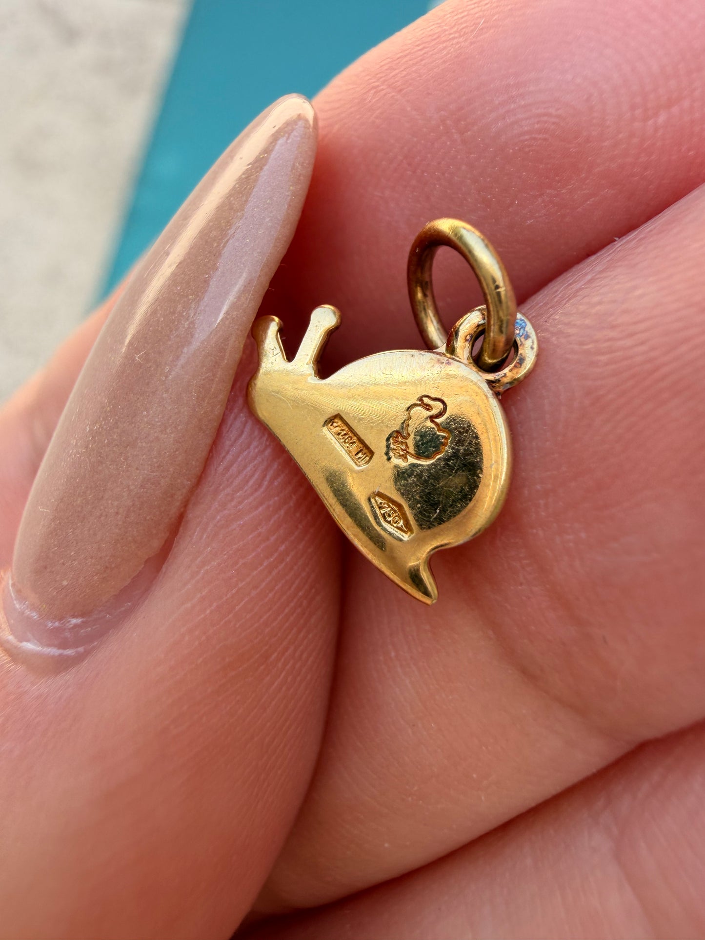 Vintage yellow 18K gold Pomellato snail charm