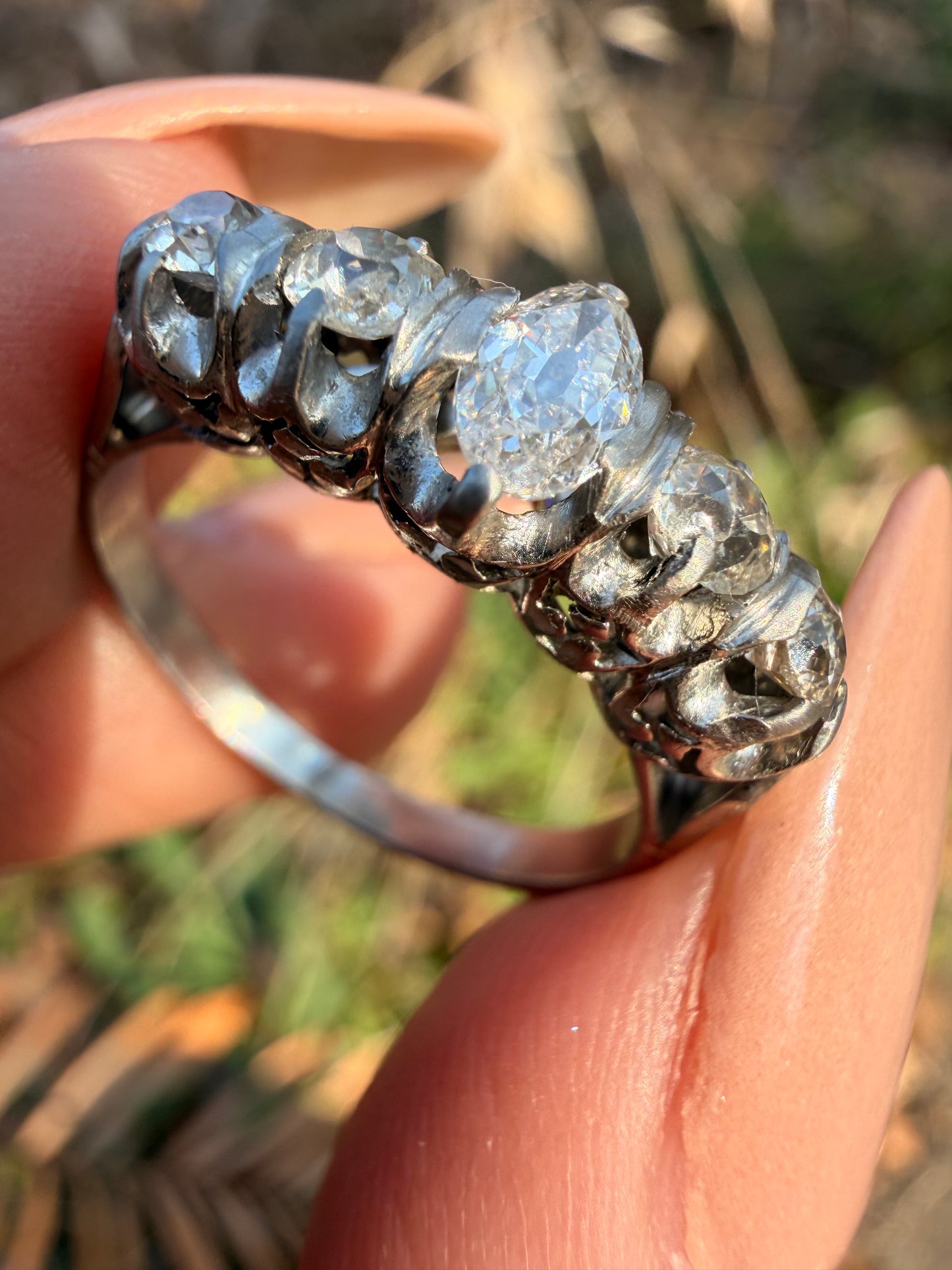 Antique platinum approx 1.1ctw moval diamond and old mine cut diamond 5 stone ring, size 5.5-5.75