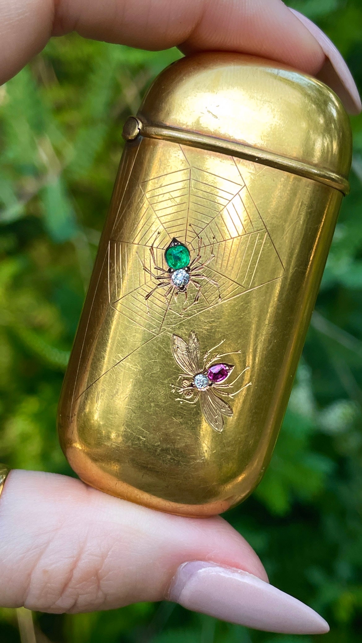 Antique 14K and 18K spider and fly engraved vesta with emerald, ruby and old mine cut diamonds