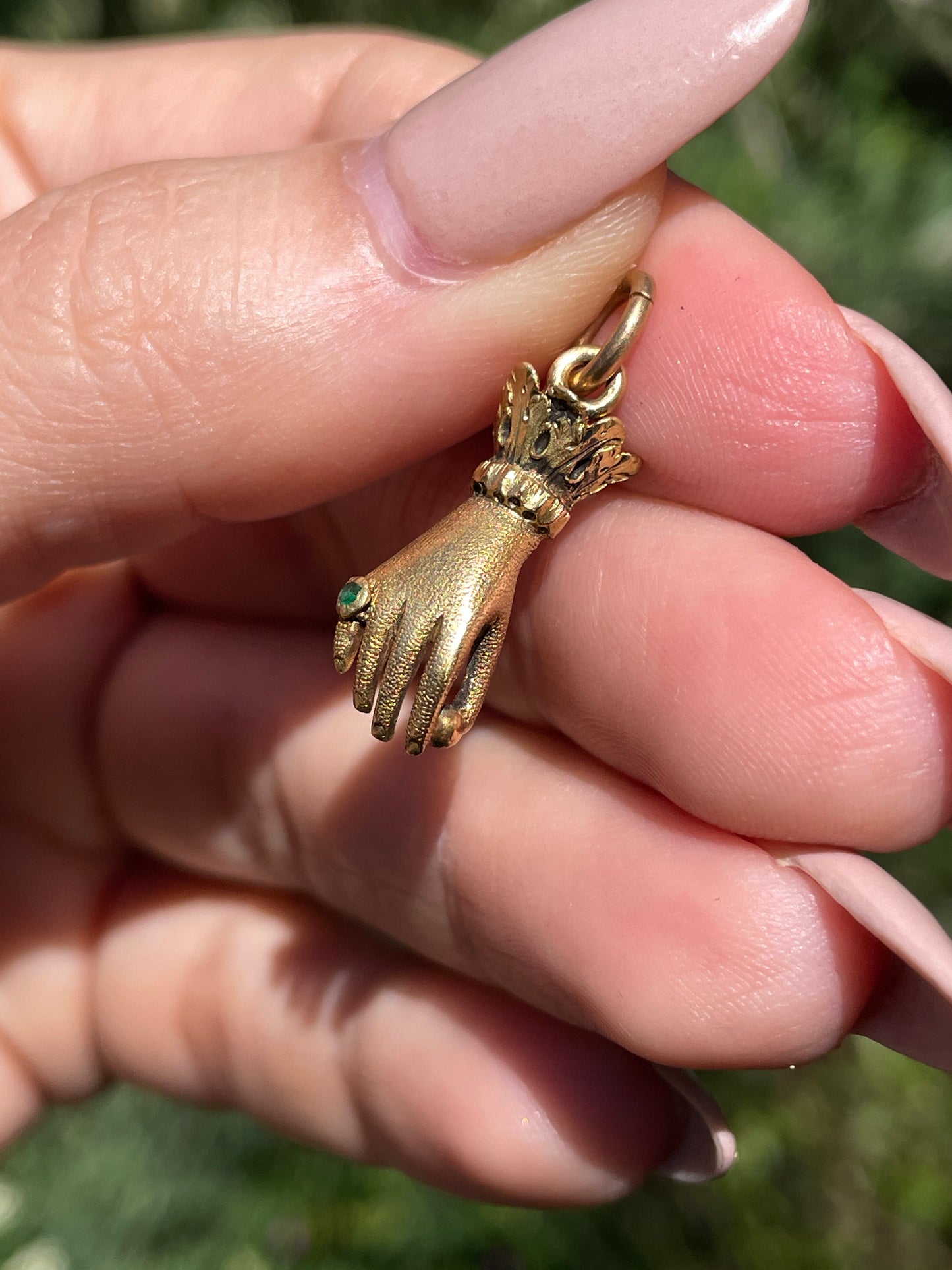 Antique yellow 18K hand charm wearing emerald ring