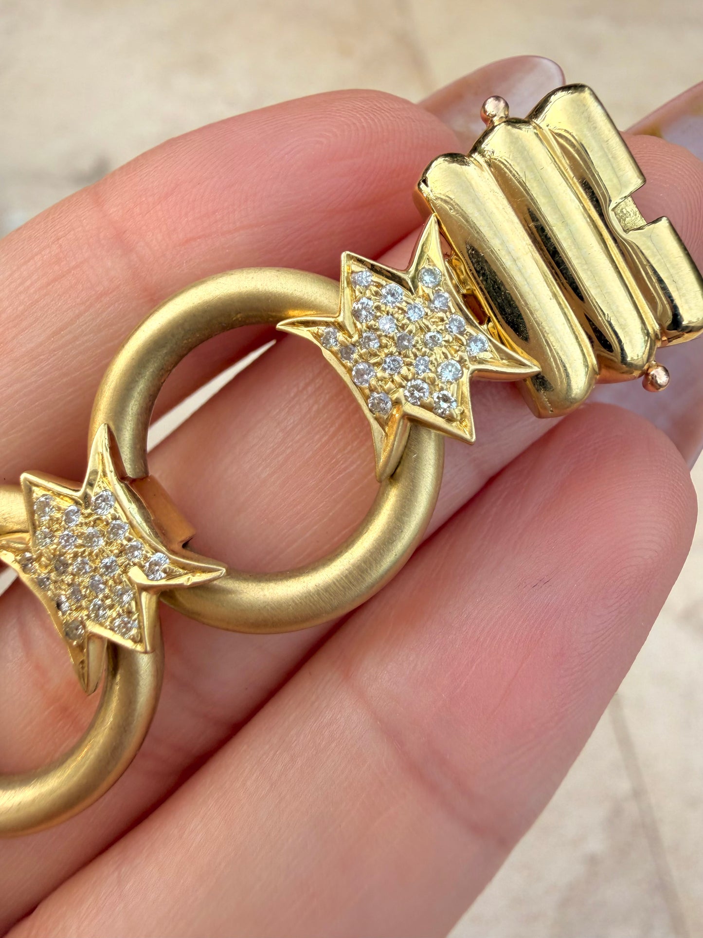 Vintage yellow 18K approx .85ctw champagne diamond starburst station open link bracelet, 7.25 inch