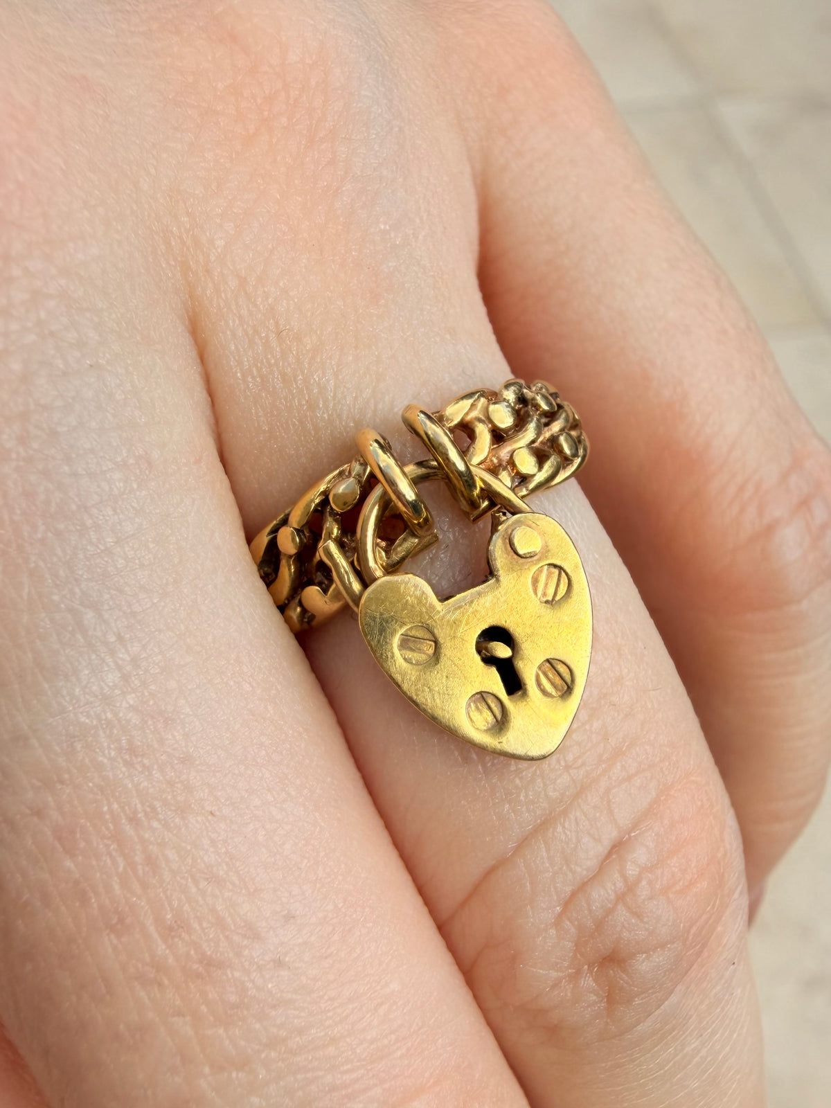 Antique yellow 14K knot ring with operating padlock, size 6.75