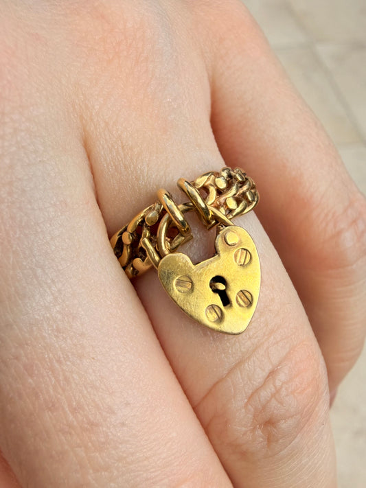Antique yellow 14K knot ring with operating padlock, size 6.75