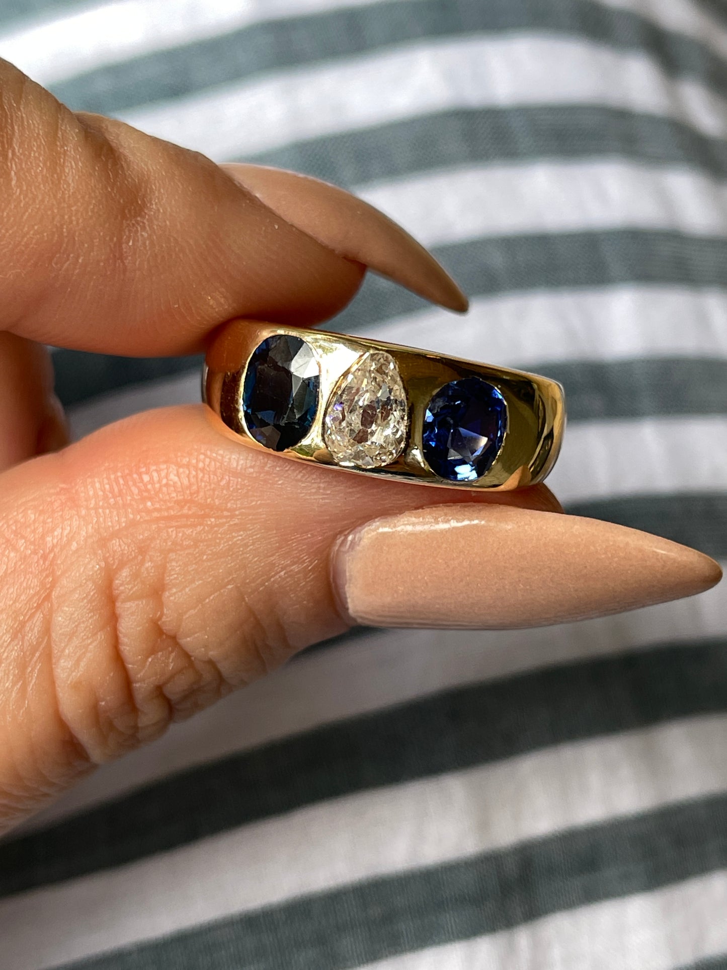 Antique yellow 14K approx .3 ctw old mine pear cut diamond and 1 ctw sapphire 3 stone ring, size 6.75
