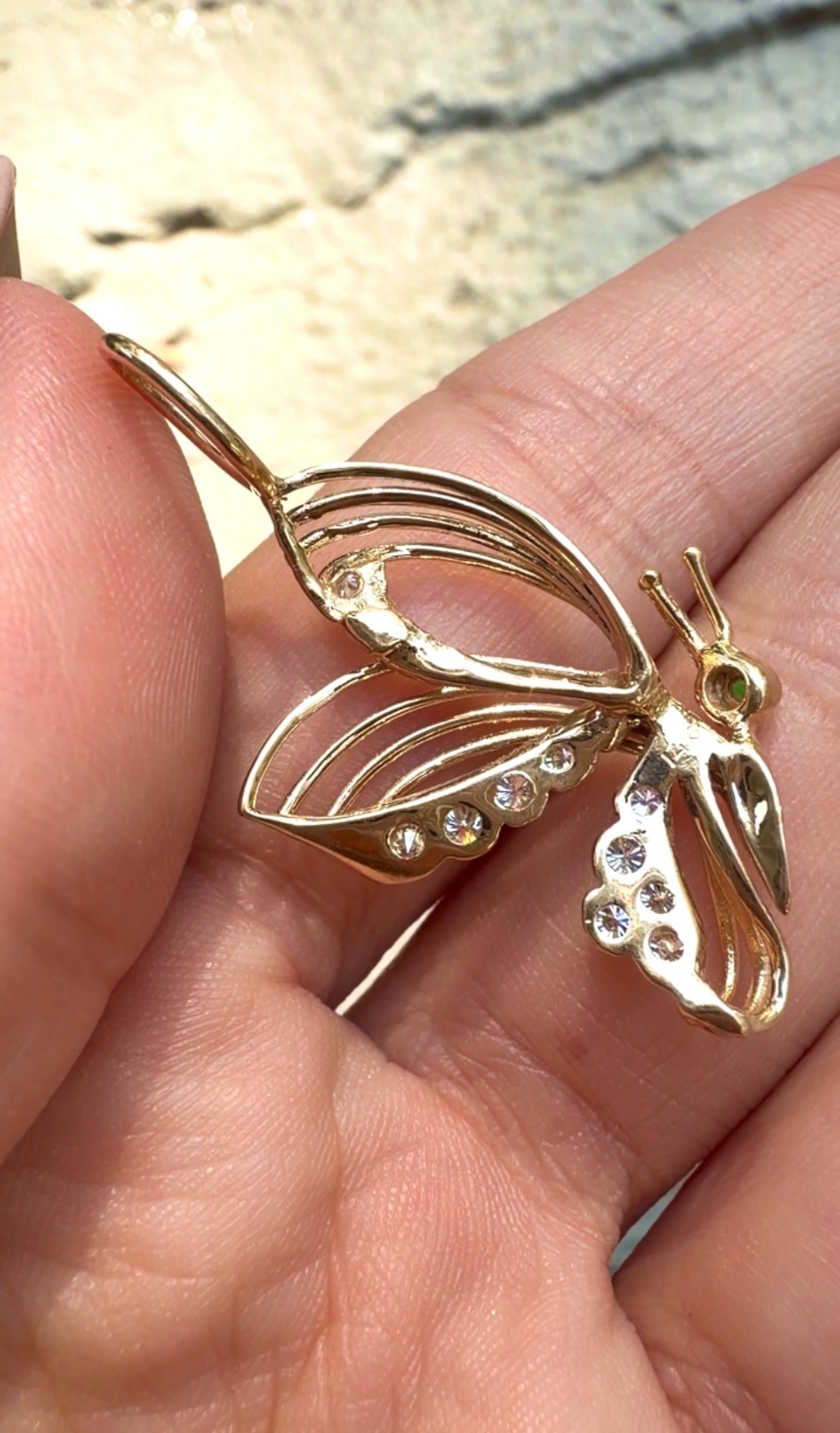 Vintage yellow 14K butterfly pendant with .2ctw diamond and emerald