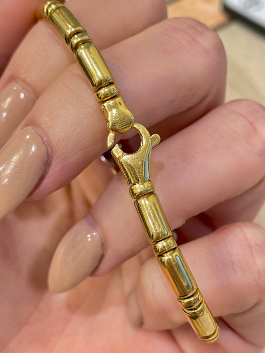 [PRIVATE] Vintage yellow and white 18K round bar link bracelet with .6 ctw bezel set diamonds, 7 inch