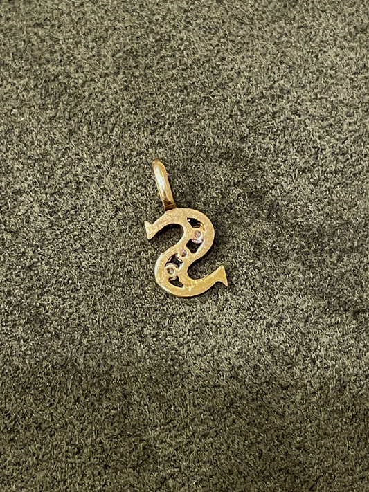 Vintage yellow 14K with .03 ctw diamonds letter S charm