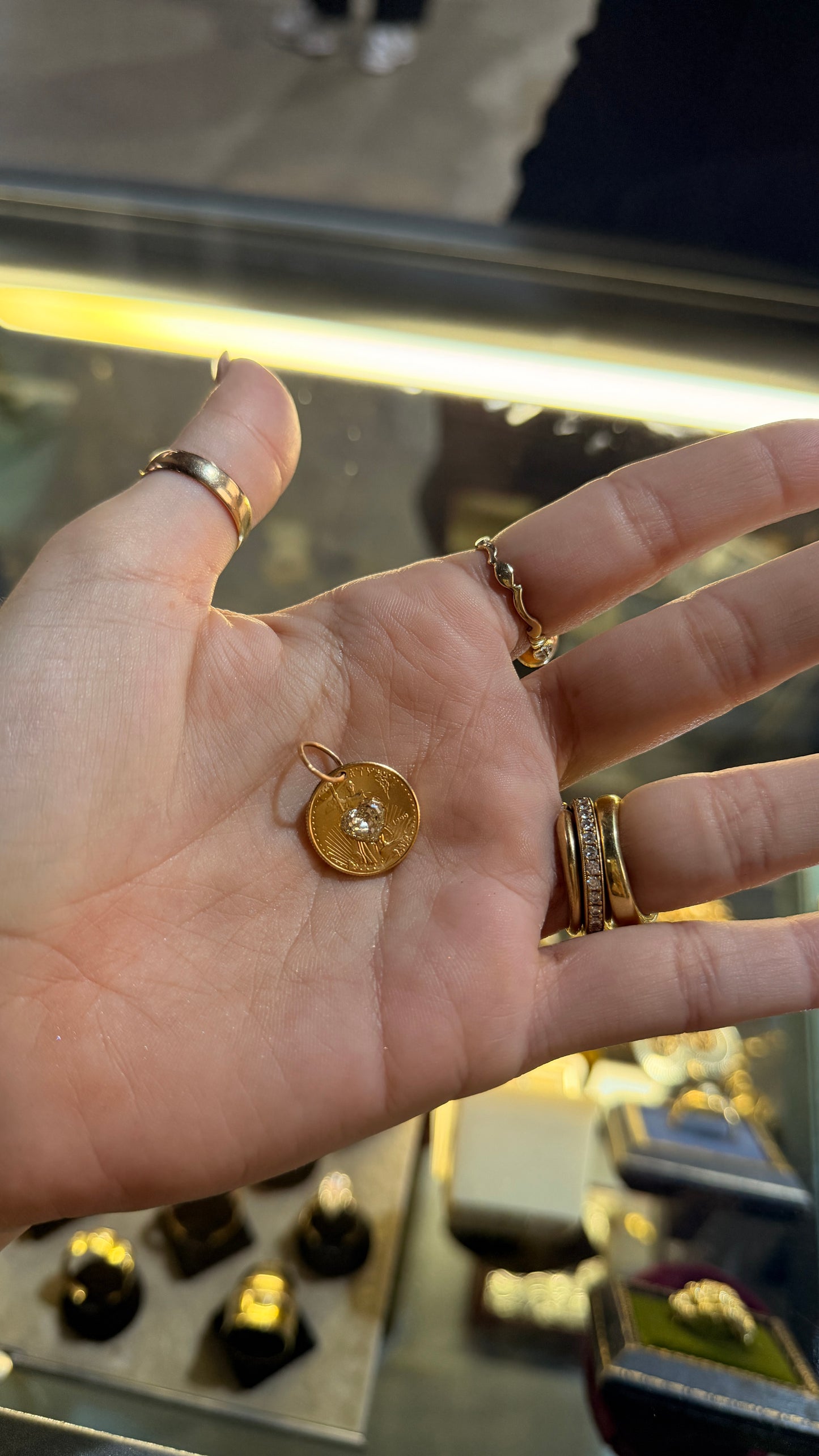 Vintage yellow 22K gold 1999 $5 US eagle coin with approx .65 ctw yellow diamond heart pendant