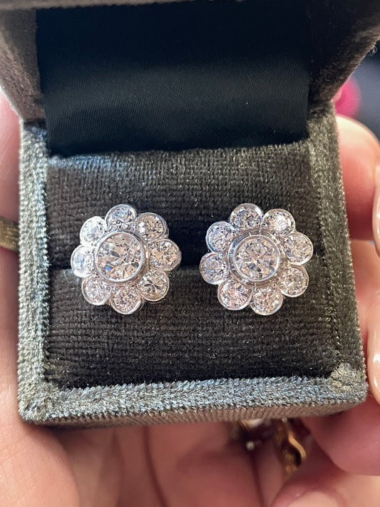 Vintage Platinum approx 4.4 ctw Old European and Round cut diamond cluster post earrings