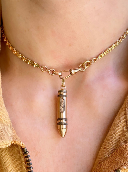 Vintage rosy yellow 10K gold engraved crayon pendant