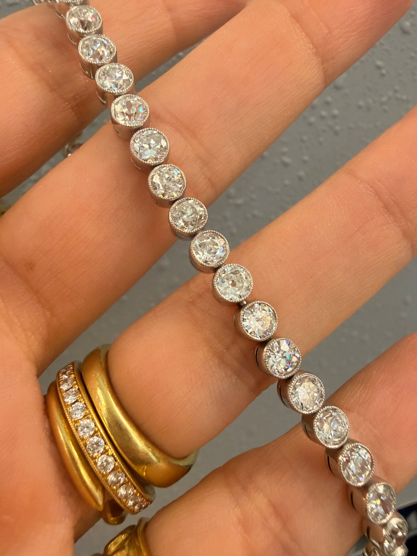 Antique Platinum 9.55ctw Old Mine Cut, Old Euro and Old Cut Diamond and European Cut Diamond bezel set bracelet, 7 and 1/8 inch