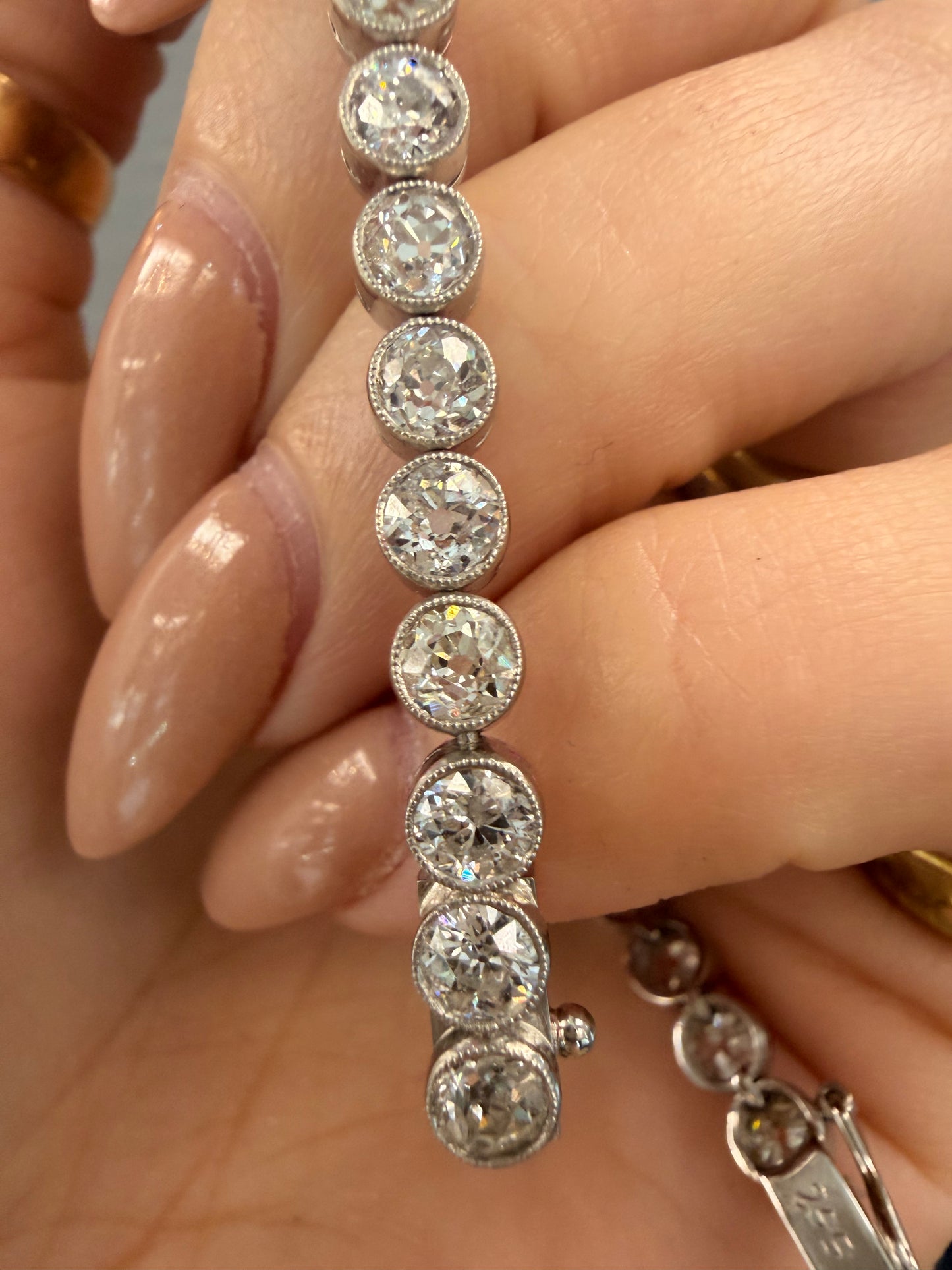 Antique Platinum 9.55ctw Old Mine Cut, Old Euro and Old Cut Diamond and European Cut Diamond bezel set bracelet, 7 and 1/8 inch