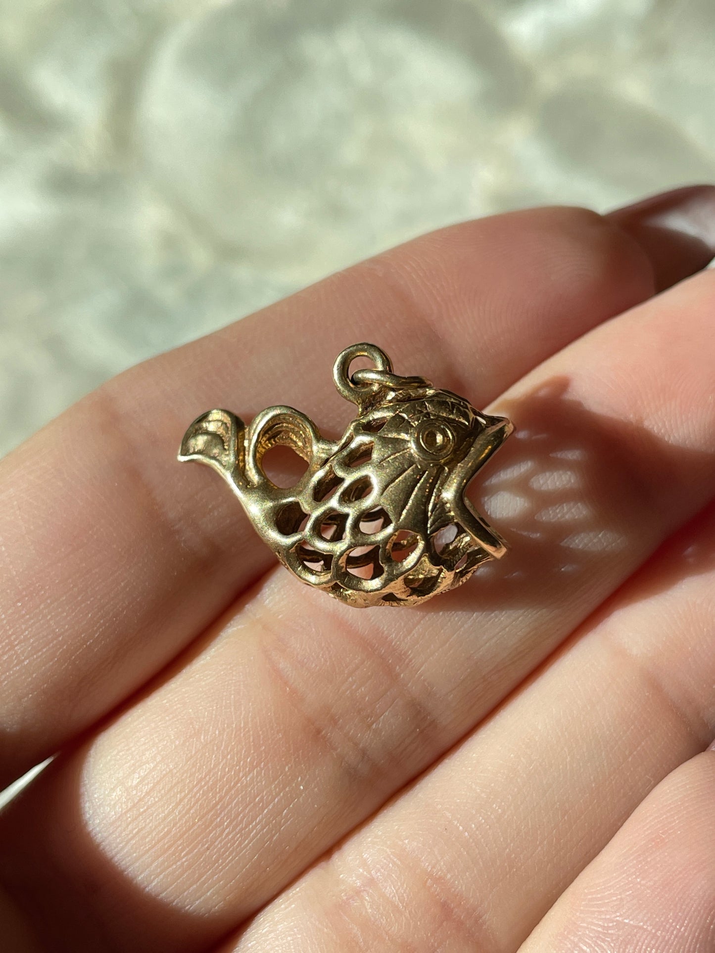 Vintage yellow 14K gold open work Fish charm