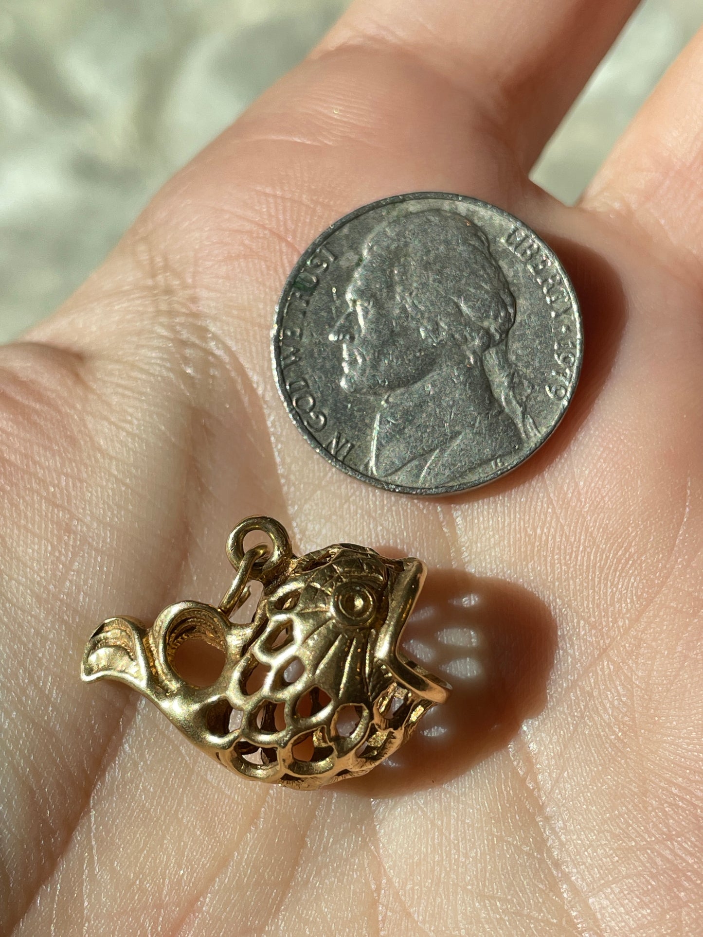 Vintage yellow 14K gold open work Fish charm