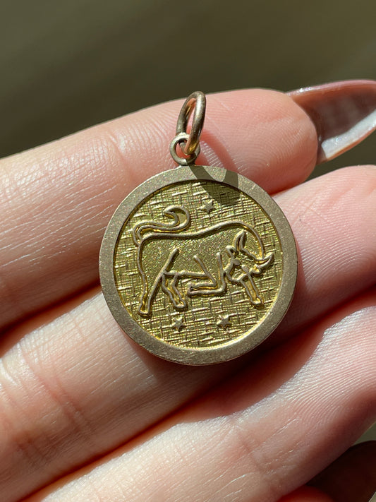 Vintage yellow 9K gold celestial Taurus pendant