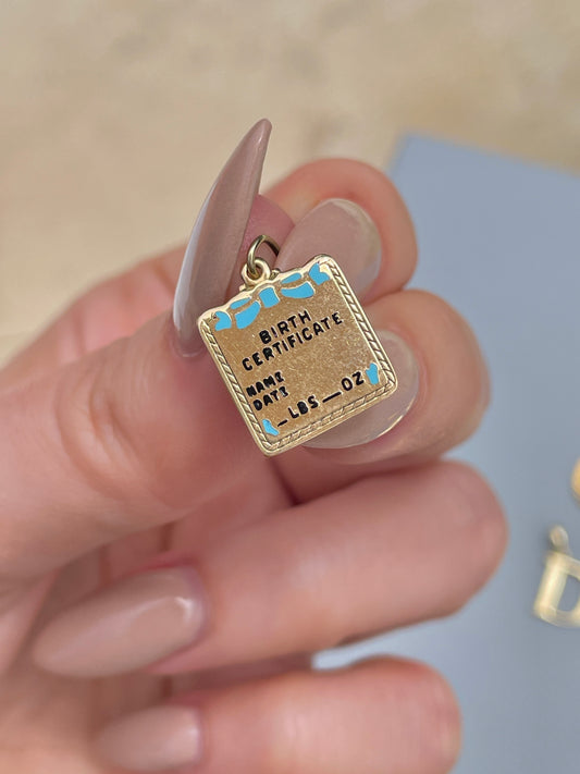 Vintage yellow 14K enamel Birth Certificate pendant