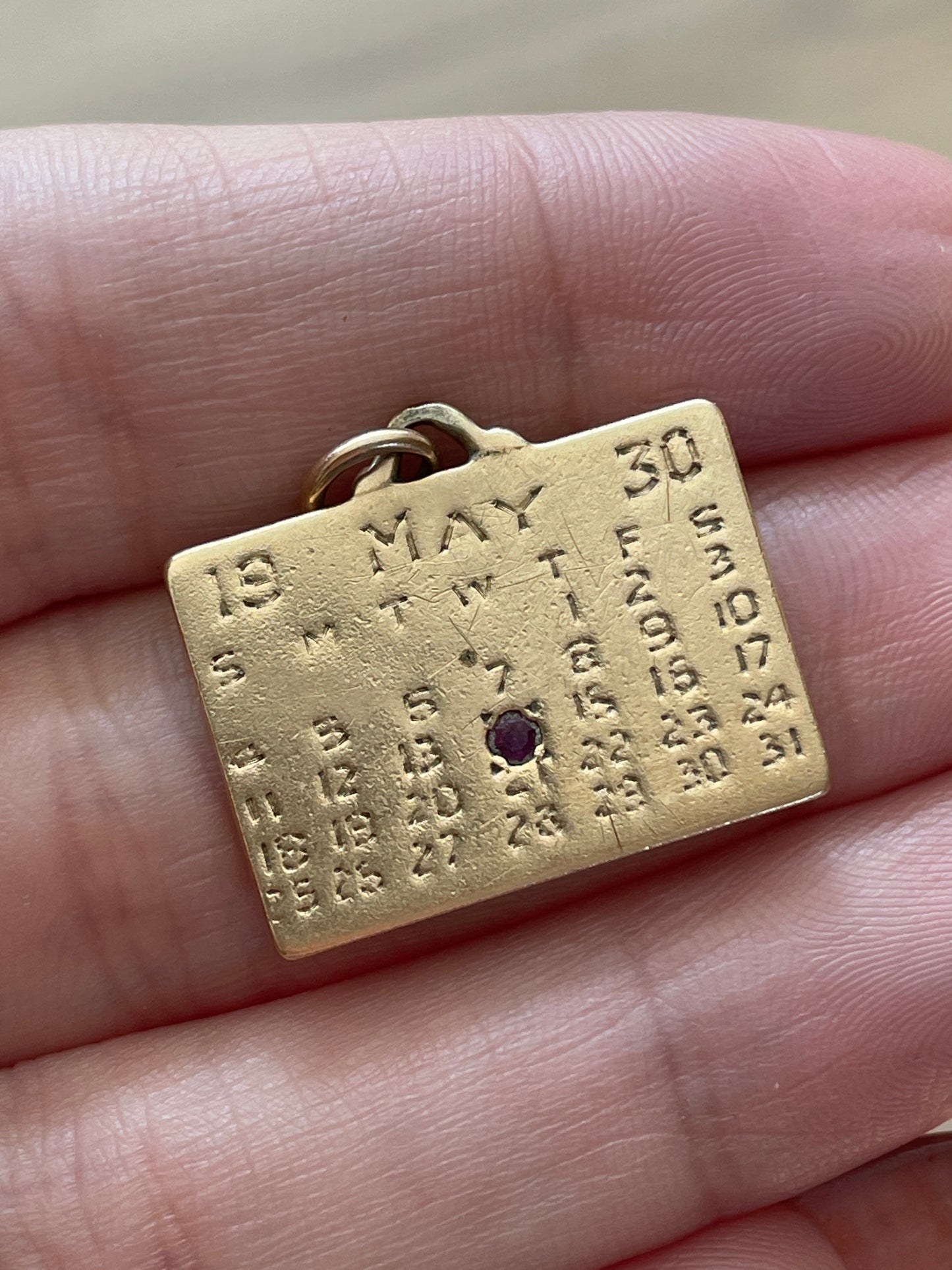 Vintage yellow 14K May month calendar pendant from 1930