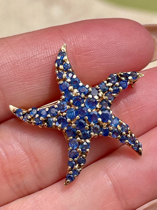 Vintage yellow 14K Starfish pin with approx 2.3 ctw sapphires