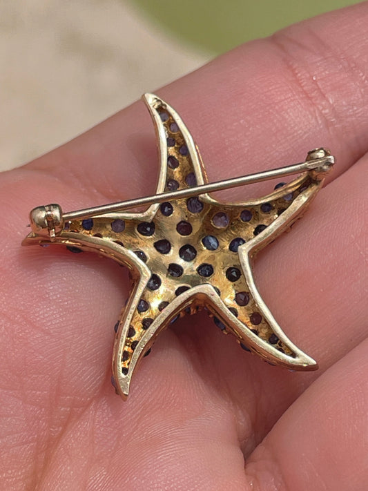 Vintage yellow 14K Starfish pin with approx 2.3 ctw sapphires