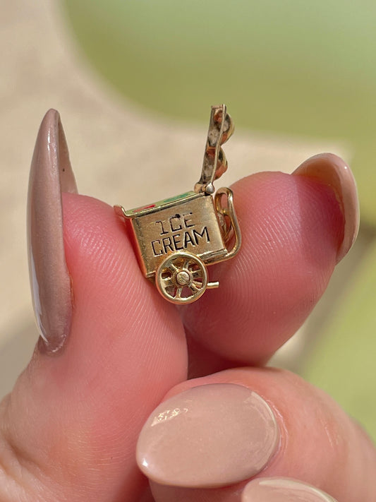 Vintage yellow 14K articulated ice cream truck with enamel