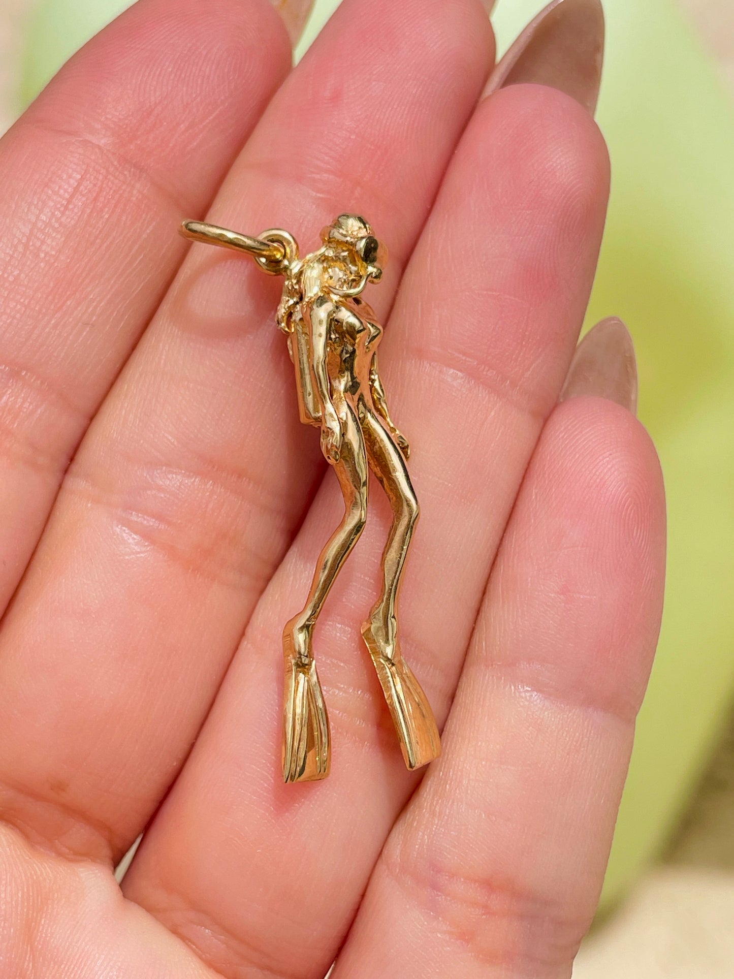 Vintage yellow 14K female scuba diver pendant