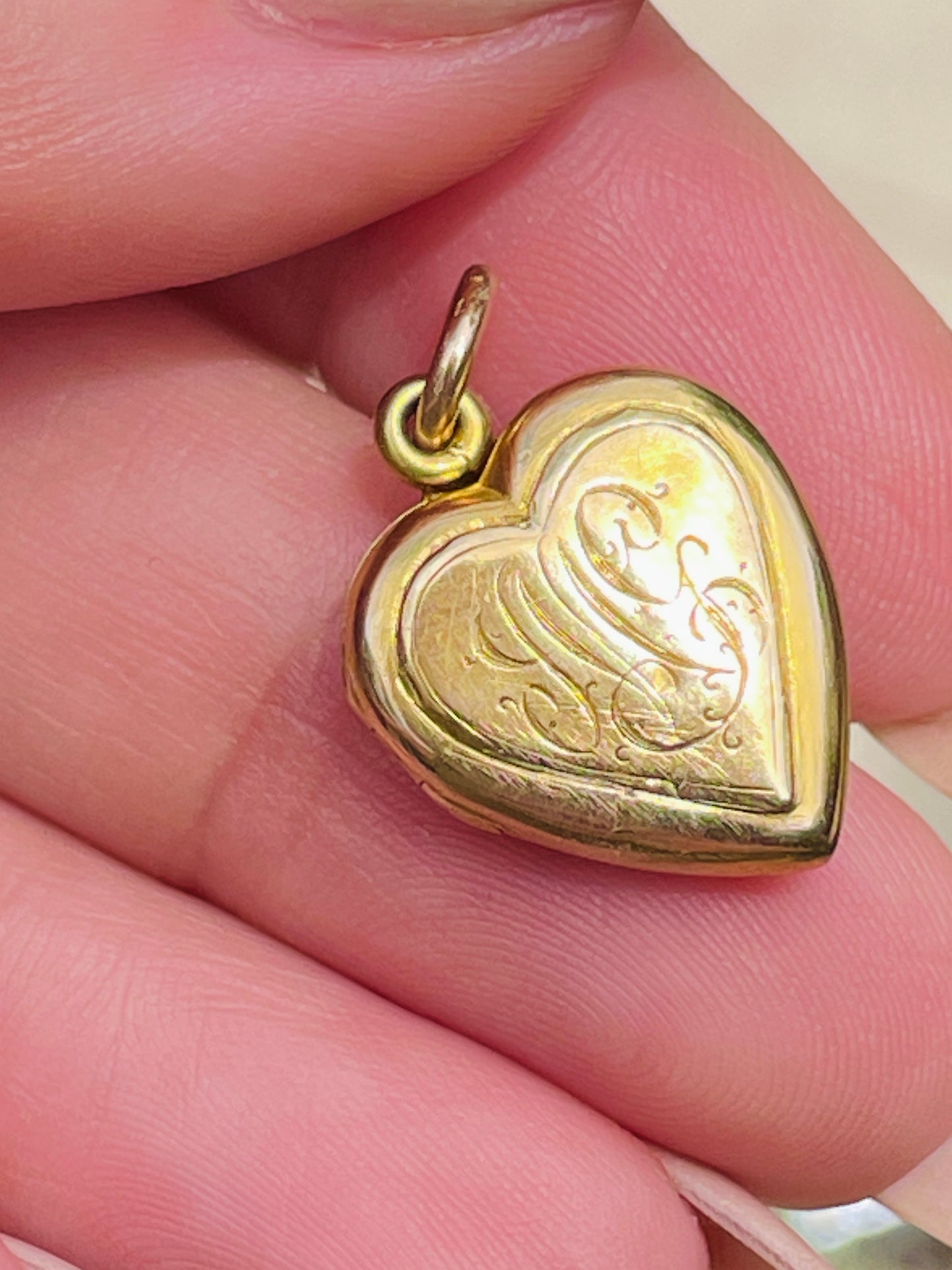 Antique yellow 14K heart locket with turquoise cabochon