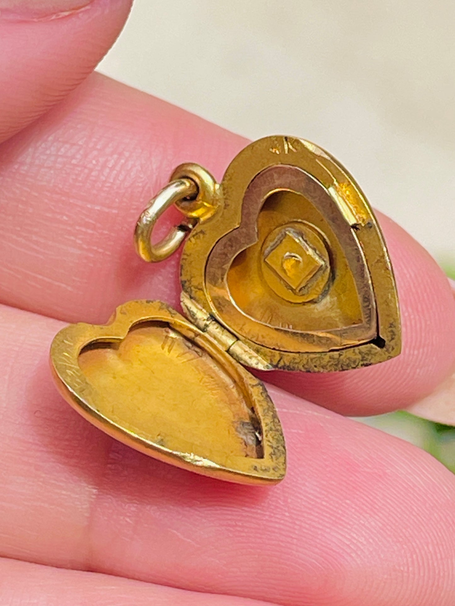 Antique yellow 14K heart locket with turquoise cabochon