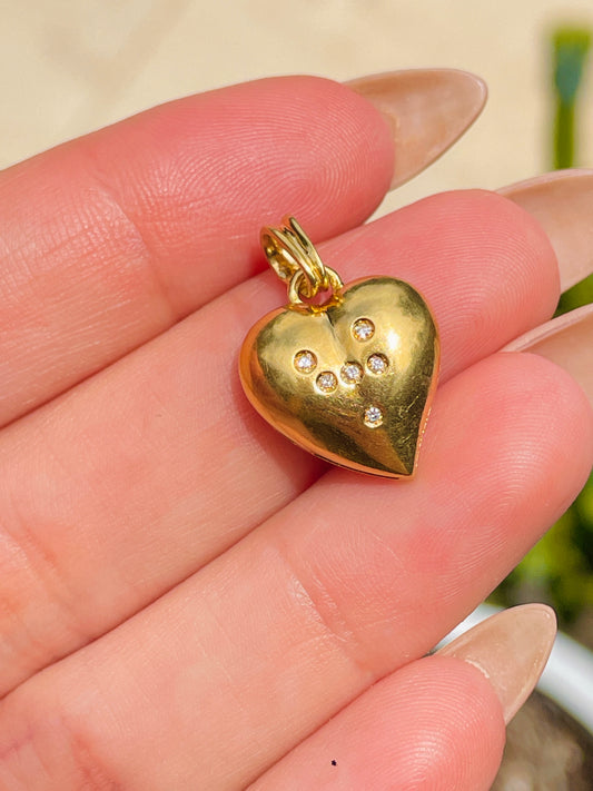 Vintage yellow 18K .08ctw diamond heart pendant