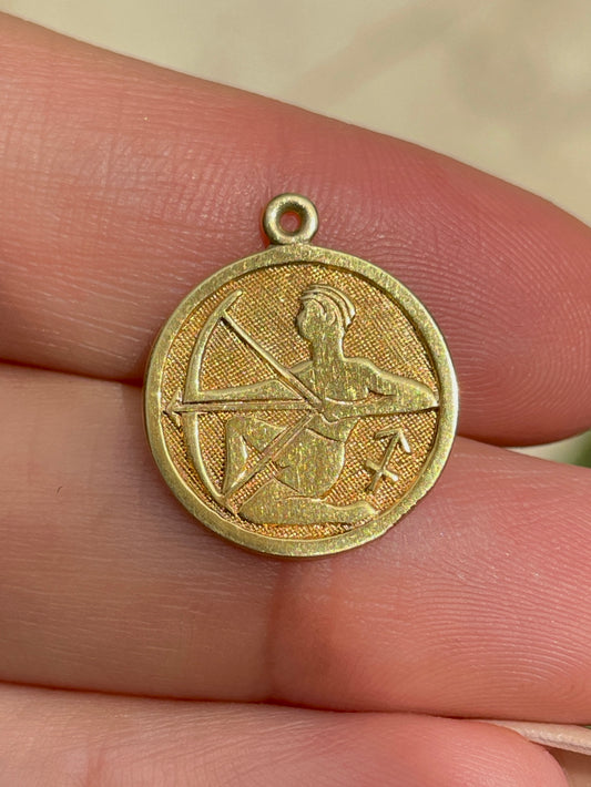 Vintage yellow 14K Sagittarius disc pendant