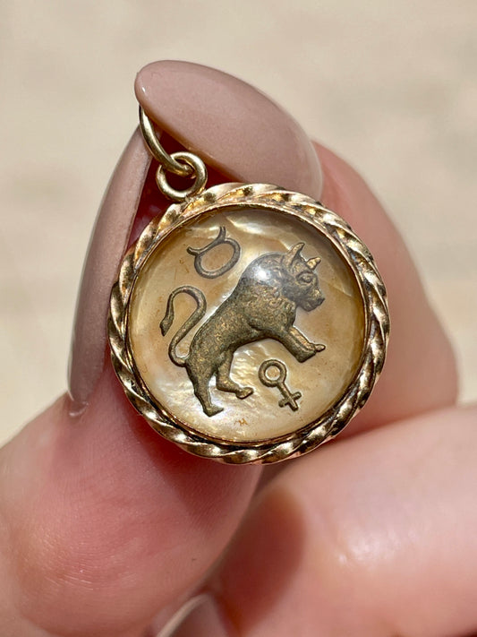 Vintage yellow 14K gold reverse crystal Taurus charm