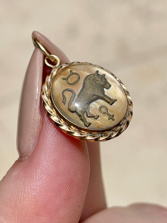 Vintage yellow 14K gold reverse crystal Taurus charm