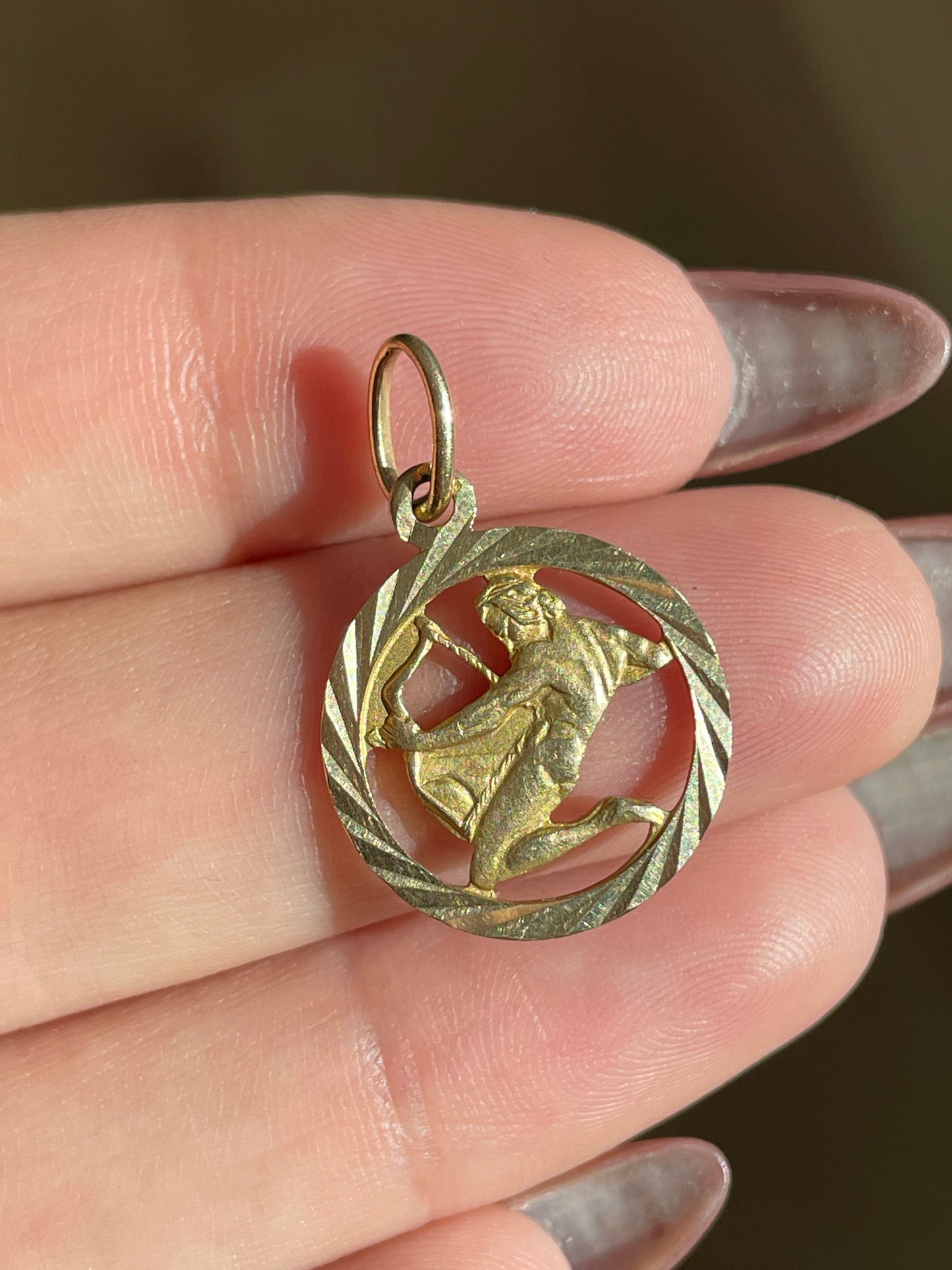 Vintage yellow 14K engine turned Sagittarius open work charm