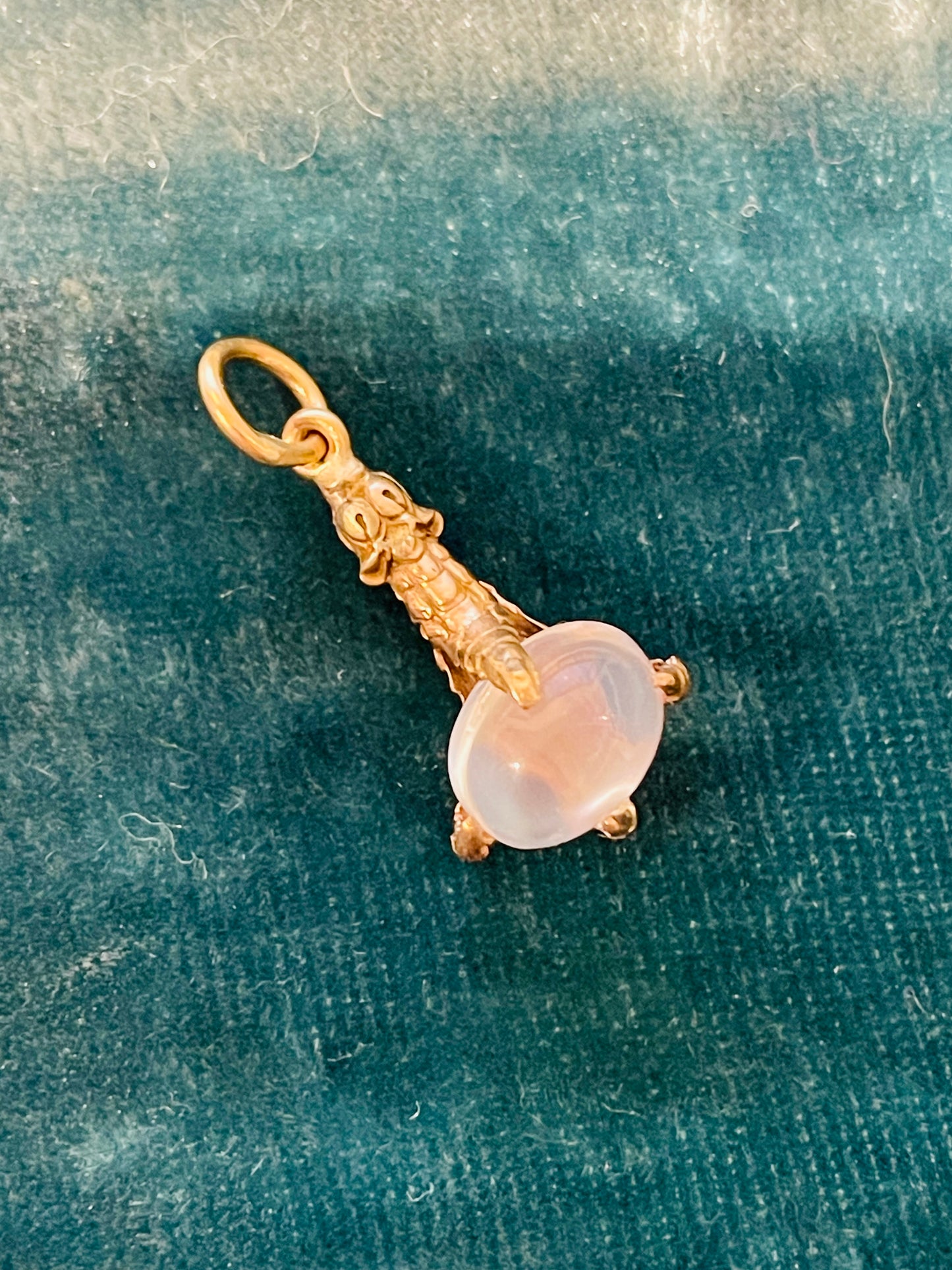 Antique yellow 14K Victorian engraved claw charm with moonstone