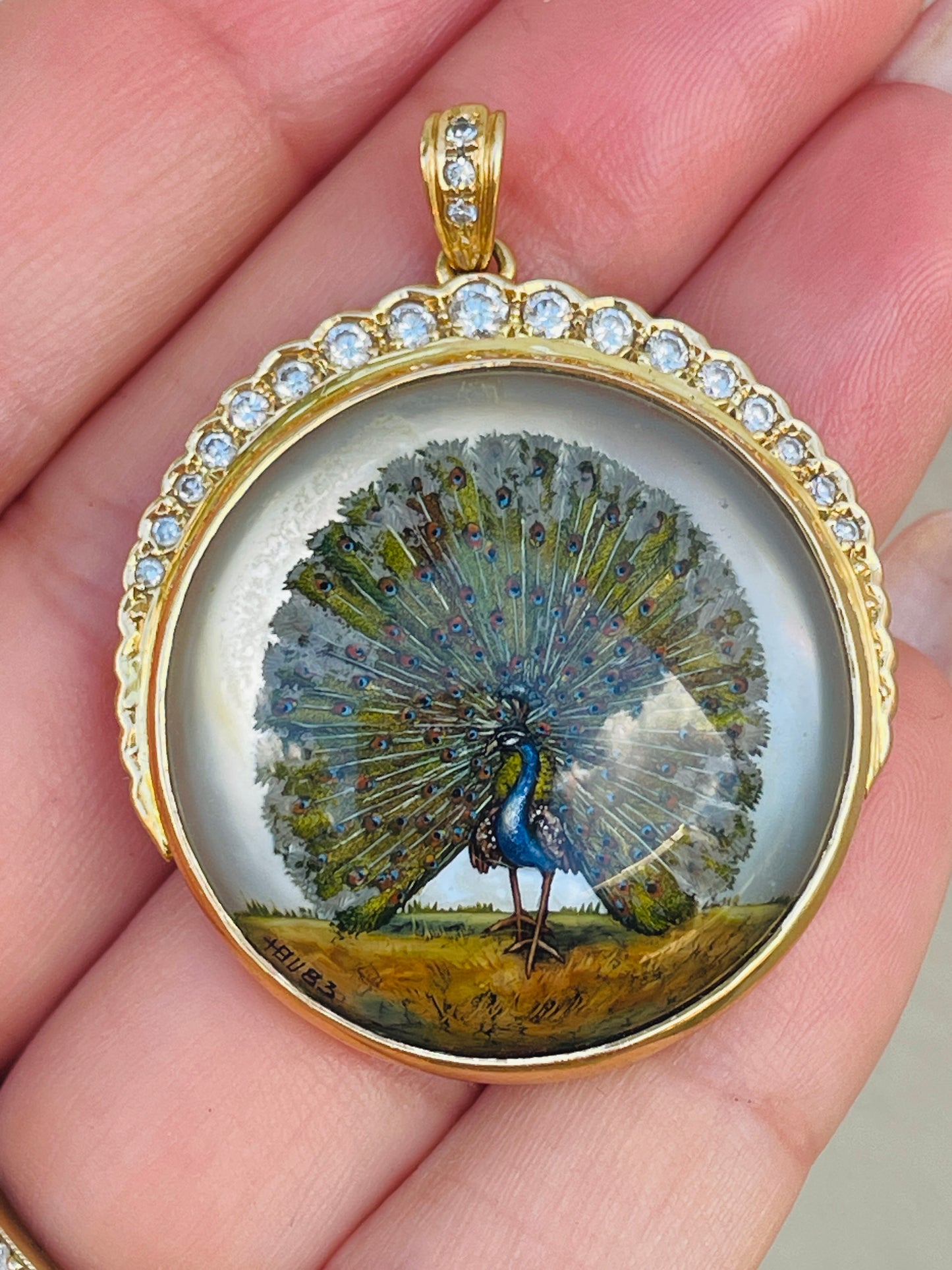 Amazing antique 18K reverse painted Peacock crystal with .7 ctw diamond crescent