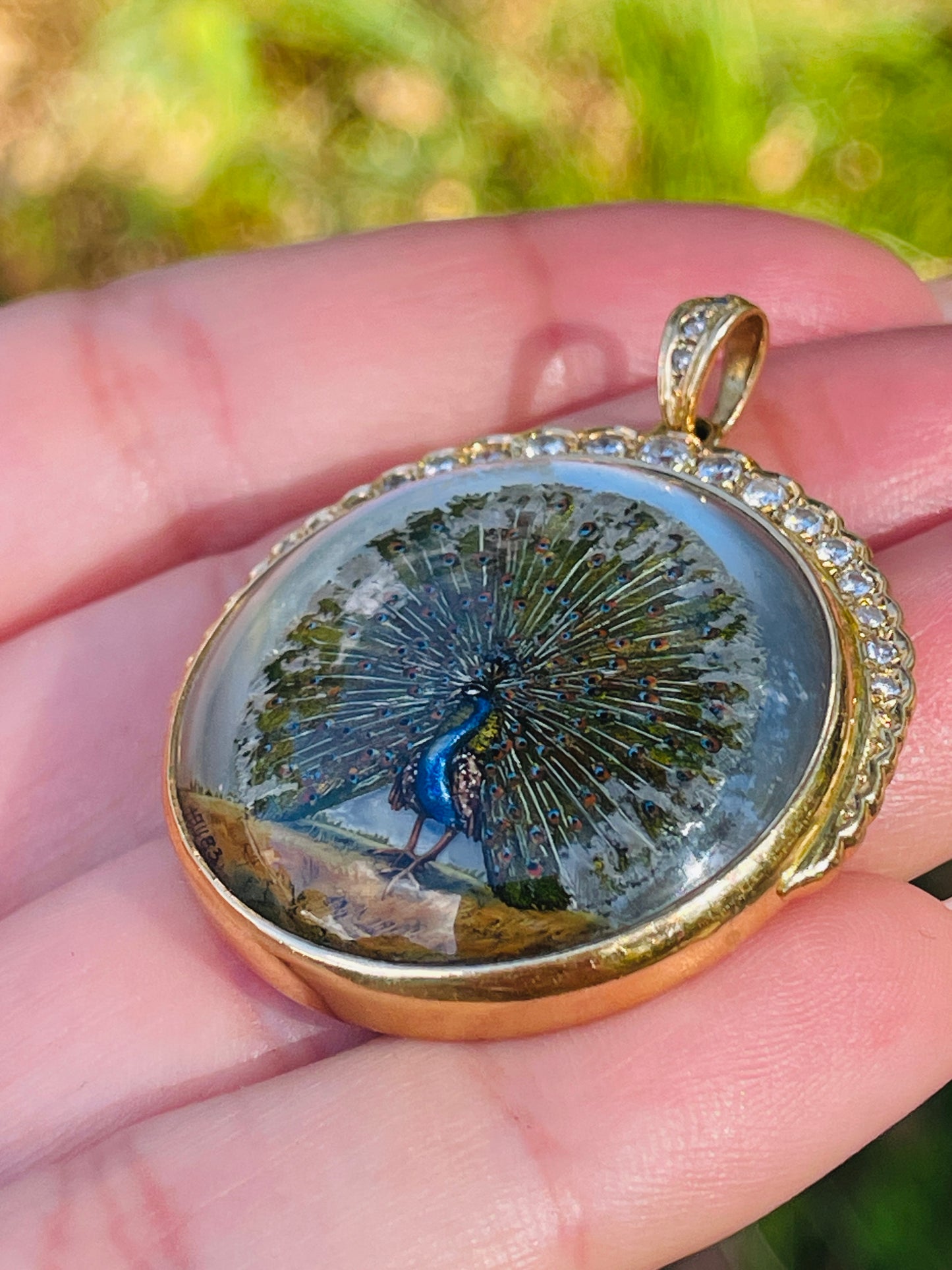 Amazing antique 18K reverse painted Peacock crystal with .7 ctw diamond crescent