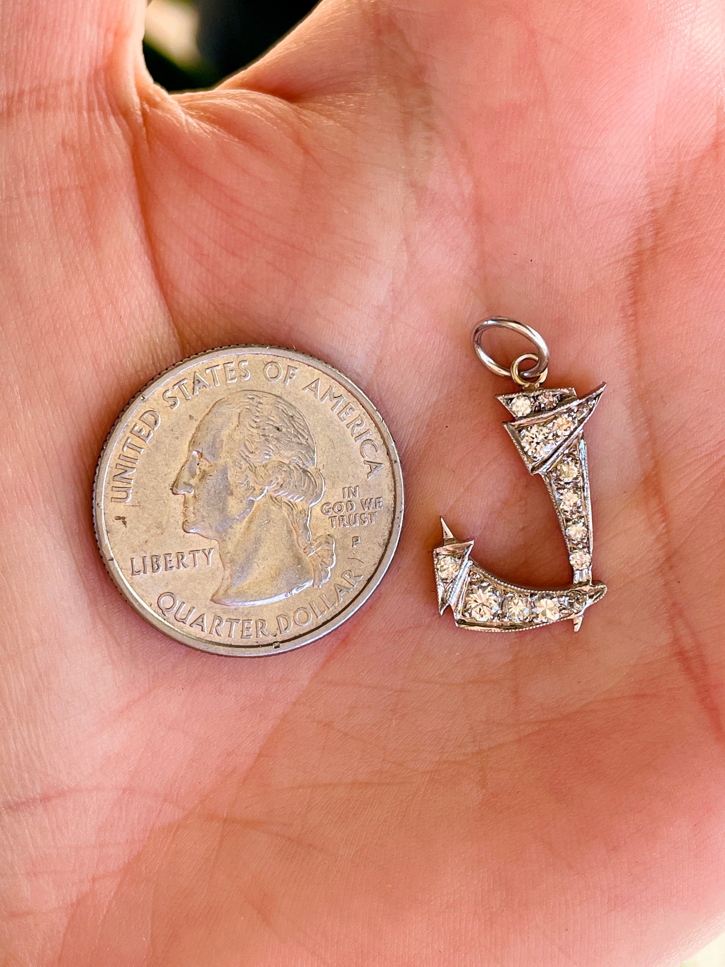 Vintage white 14K letter J charm with approx .75 ctw diamonds