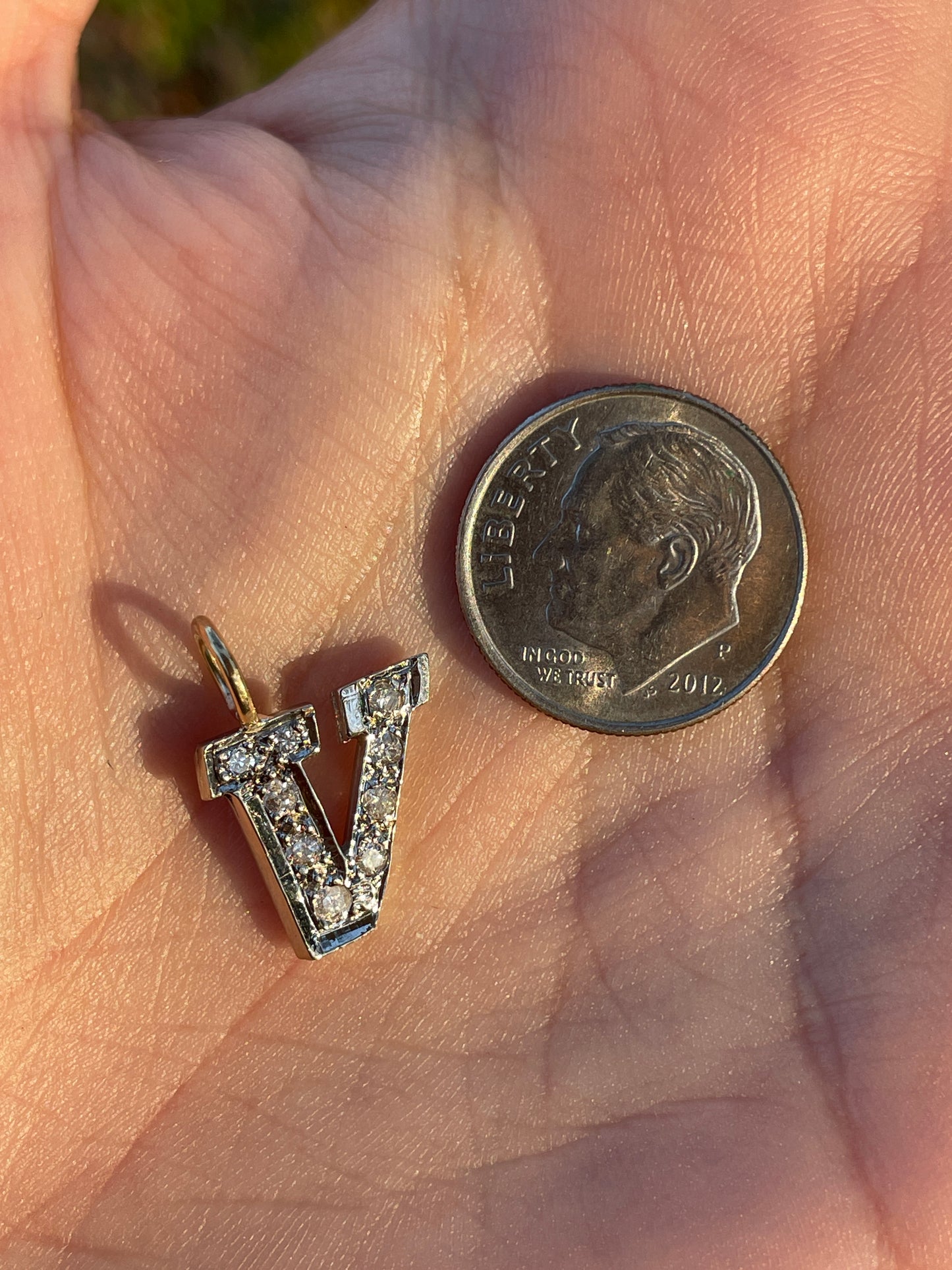 Vintage yellow and white 14K letter V charm with approx .27 ctw diamonds