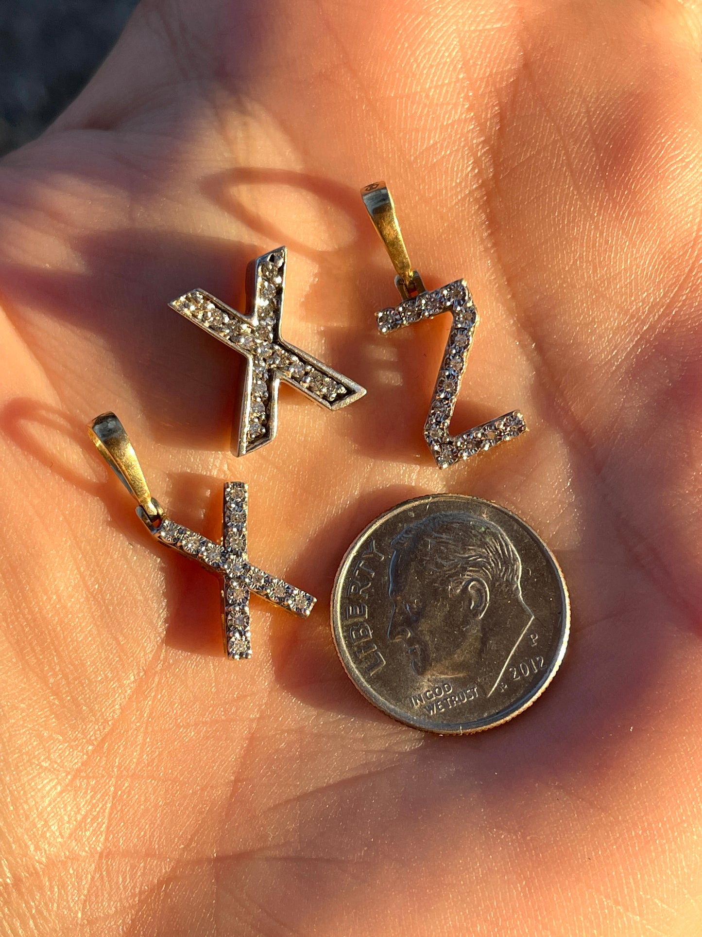 Vintage white 14K letter X charm with approx .13 ctw diamonds