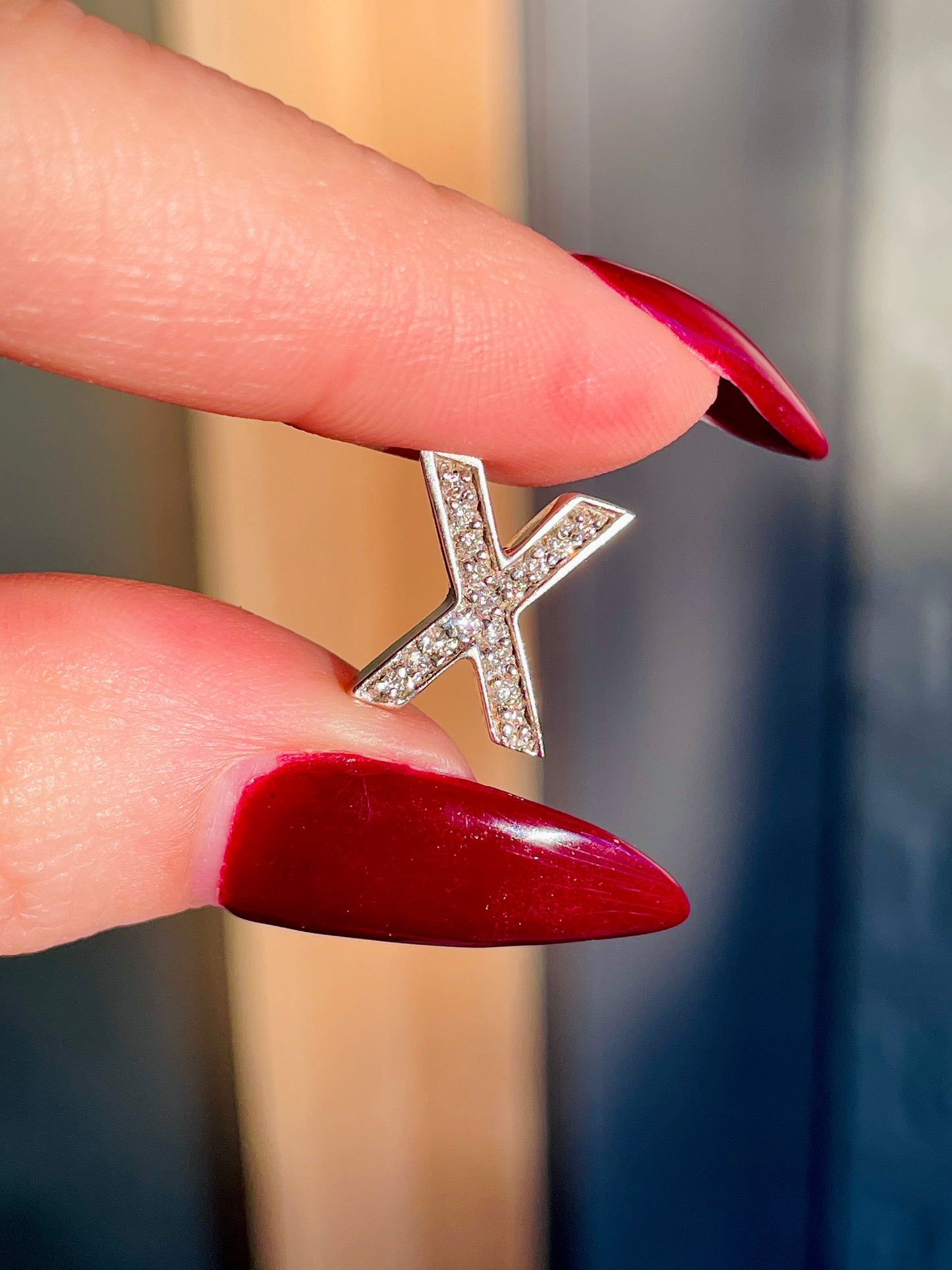 Vintage white 14K letter X charm with approx .13 ctw diamonds