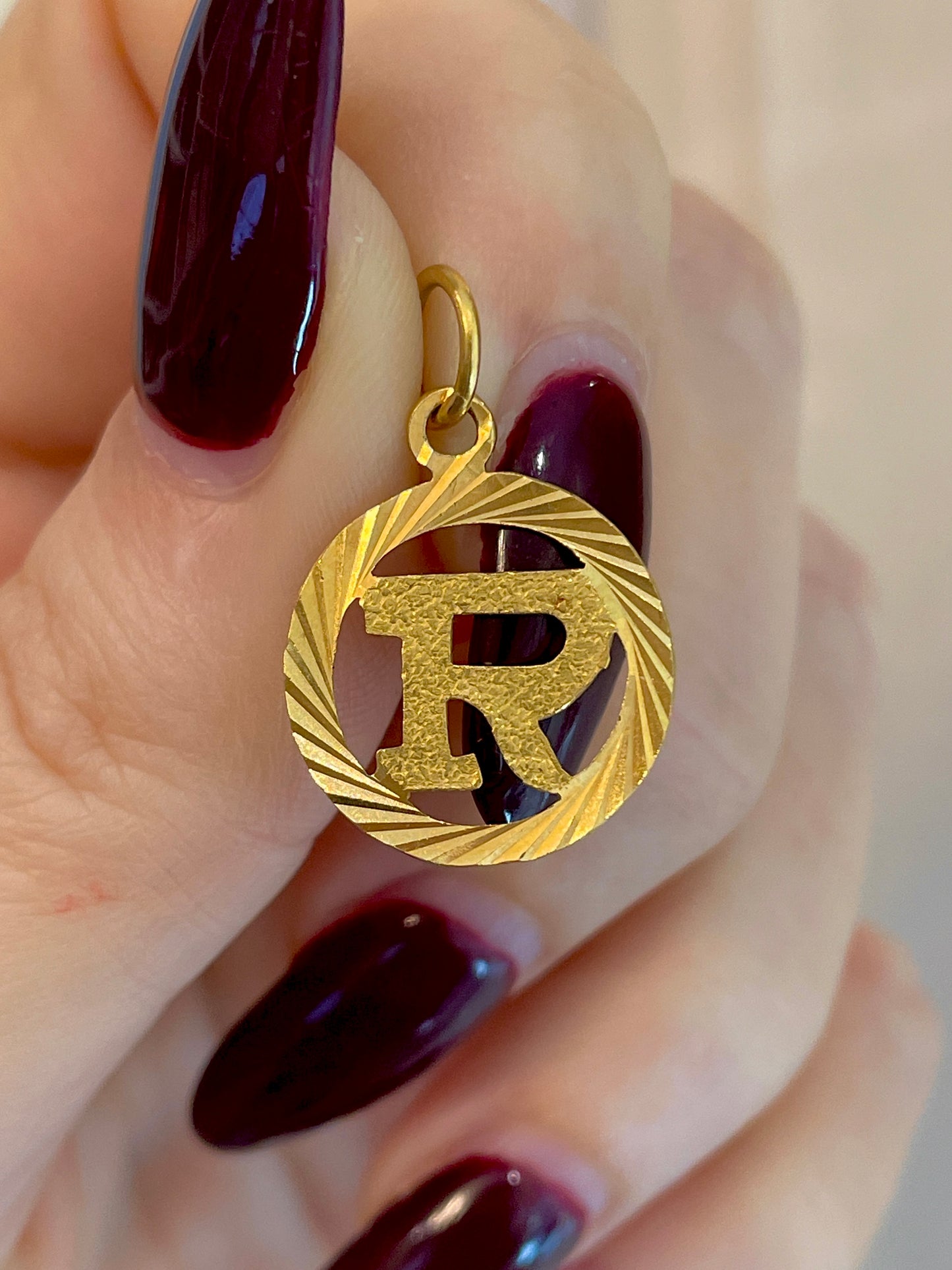 Vintage yellow 22K letter R engine turned charm