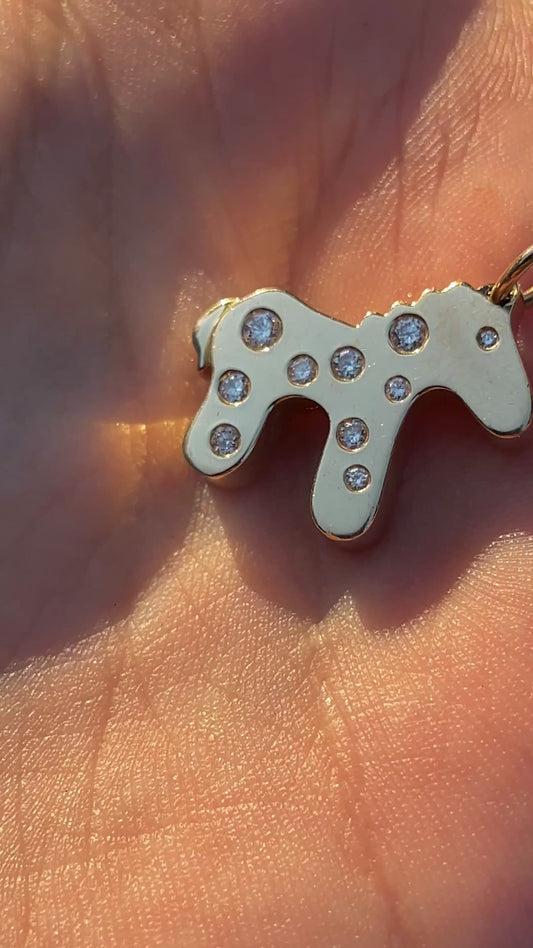 Estate yellow 14K pony charm with .45 ctw bezel set diamonds