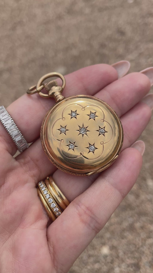 Antique yellow 14K and star set old cut diamond pocket watch with pink enamel detail