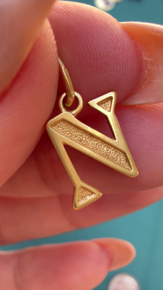 Vintage yellow 18K gold textured letter N charm