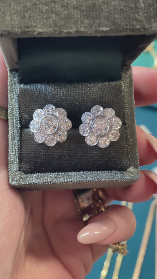 Vintage Platinum approx 4.4 ctw Old European and Round cut diamond cluster post earrings