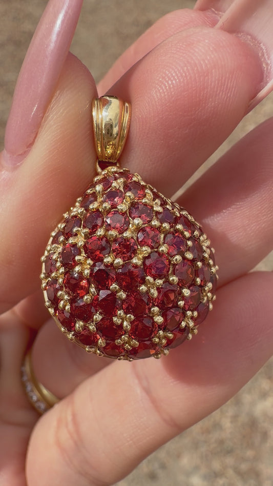 Vintage yellow 14K gold and garnet shell charm