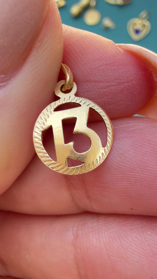 Vintage yellow 18K gold number 13 charm