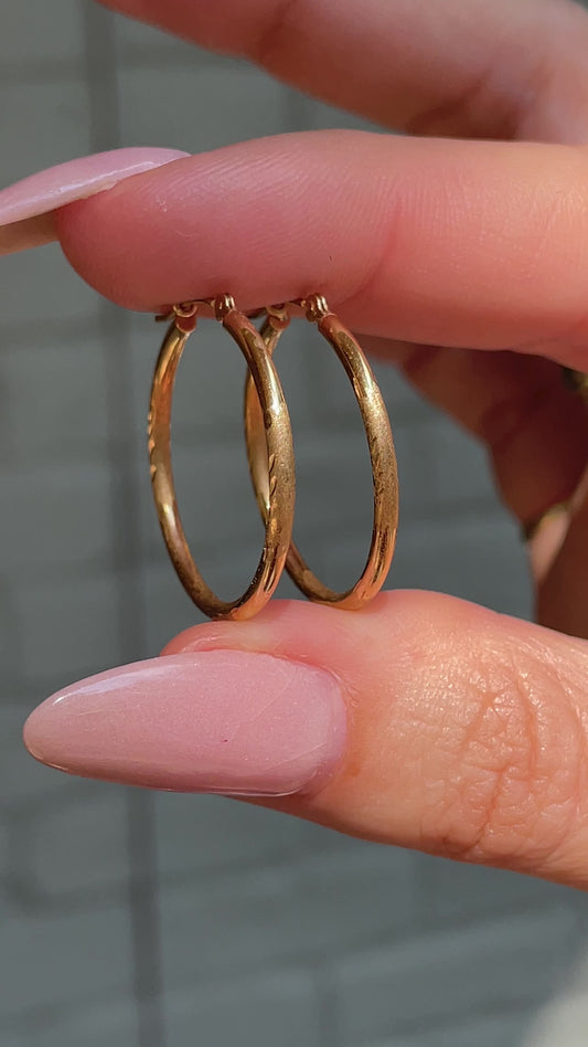 Vintage yellow 14K gold etched tube hoop earrings