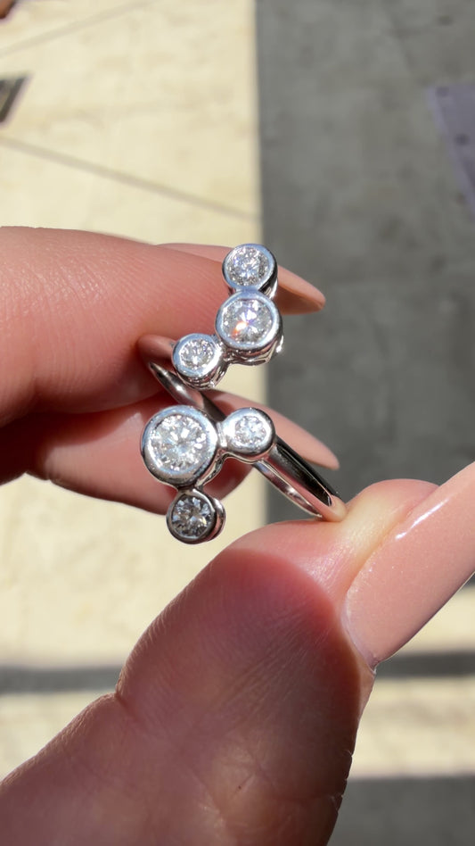 White 14K bezel set approx .55ctw diamond bubble ring, size 7.5